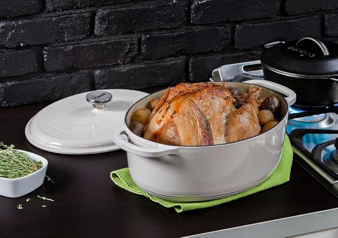 Lodge 7 Quart Enameled Cast Iron Oval Dutch Oven with Lid – Dual Handles – Oven Safe up to 500° F or on Stovetop - Use to Marinate, Cook, Bake, Refrigerate and Serve – Oyster White