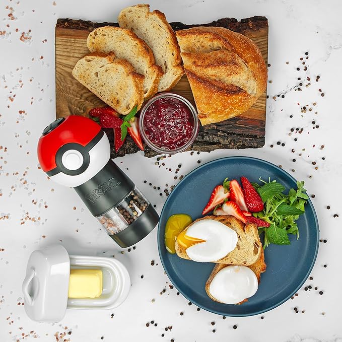 Uncanny Brands Pokémon Poké Ball Salt and Pepper Grinder – Dual Chamber Electric Mill with Adjustable Coarseness and LED Light – Battery Powered
