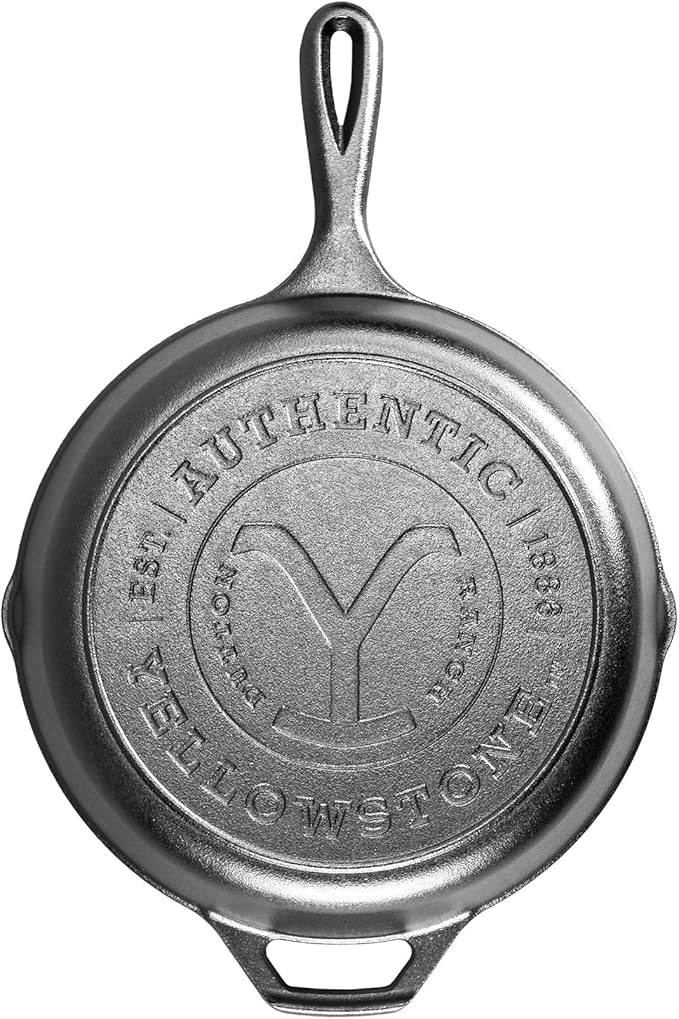 Lodge Pre-Seasoned Yellowstone Stamped Cast Iron Cookware - Signature Teardrop Handle - Use in the Oven, on the Stove, on the Grill, or Over a Campfire - 10.25 Inch Logo Skillet