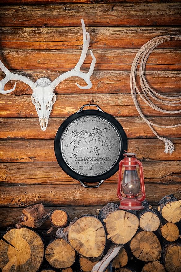 Lodge Pre-Seasoned Yellowstone Stamped Cast Iron Cookware - Signature Teardrop Handle - Use in the Oven, on the Stove, on the Grill, or Over a Campfire - 17 Inch Logo Skillet